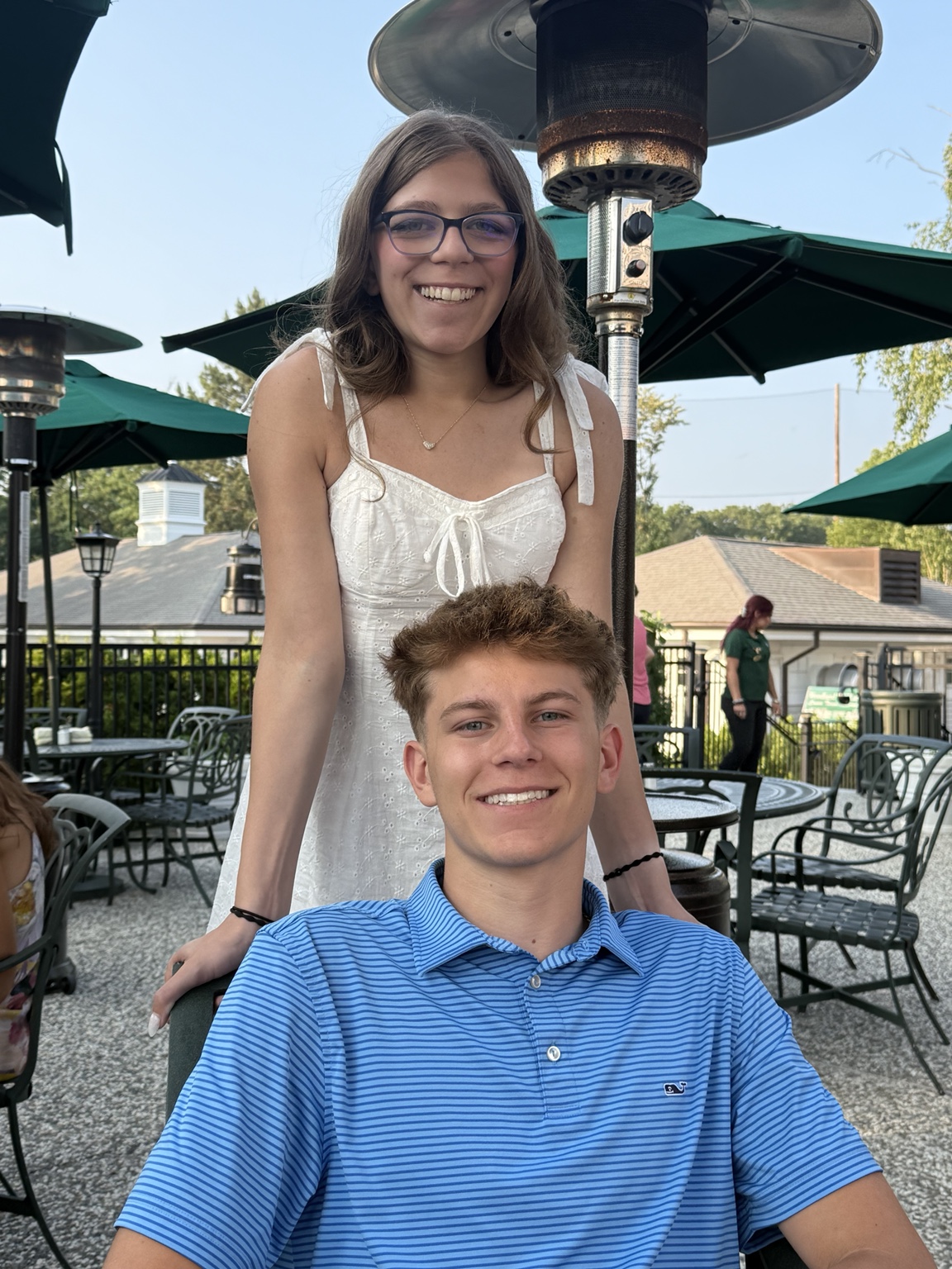 Lauren and Brady smiling together outdoors