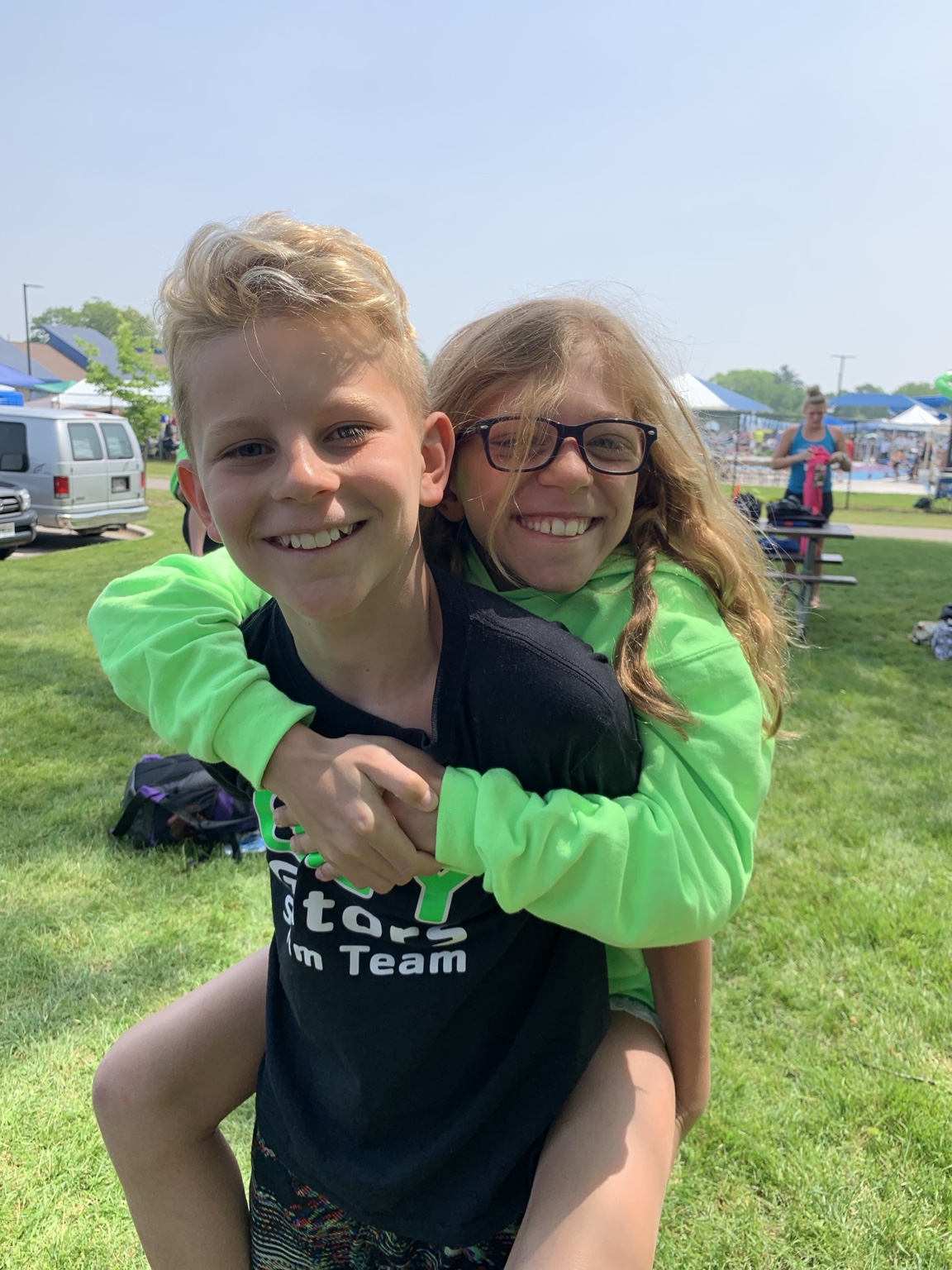 Lauren giving Brady a piggyback ride